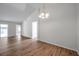 Bright living room with new wood floors and an open floorplan, excellent for gatherings at 1408 Birchstone Ave, Brandon, FL 33511