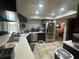 Modern kitchen featuring stainless steel appliances and ample counter space at 1445 72Nd Ne Ave, St Petersburg, FL 33702