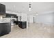 Well-lit kitchen featuring stainless steel appliances, a center island, and modern finishes at 14498 Whitewater Way, Brooksville, FL 34604