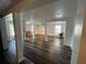 Basement with modern flooring, exposed brick, supporting pillars, and lots of open space at 145 20Th Se Ave, St Petersburg, FL 33705