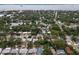 Neighborhood aerial view with mature trees and easy access to the open bay at 1526 San Mateo Dr, Dunedin, FL 34698