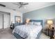 Well-lit bedroom with neutral tones and a comfortable, inviting feel at 17222 Holly Well Ave, Wimauma, FL 33598