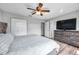Spacious bedroom includes a closet and a large dresser at 1851 Skyland Dr, Clearwater, FL 33759