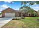Inviting home with a well-manicured lawn and updated features offering great curb appeal at 1851 Skyland Dr, Clearwater, FL 33759
