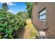 Side yard featuring a privacy fence and gate at 1851 Skyland Dr, Clearwater, FL 33759