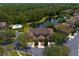 Beautiful townhome community with a tranquil lake, fountain, and inviting pool area at 18939 Duquesne Dr, Tampa, FL 33647