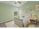 Inviting ' bedroom with mint-green walls and modern decorations, creating a cozy atmosphere at 18939 Duquesne Dr, Tampa, FL 33647