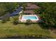 Enjoy the community pool with ample lounge seating, perfect for relaxing in the sun at 18939 Duquesne Dr, Tampa, FL 33647