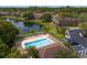 Cool off in the community pool with plenty of lounge chairs and scenic water views at 18939 Duquesne Dr, Tampa, FL 33647