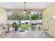 Enclosed back porch provides space for conversation and peaceful views of the back yard at 1934 Samantha Ln, Valrico, FL 33594