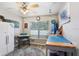This bedroom boasts light walls, ceiling fan, and a window allowing plenty of natural light to enter the room at 1934 Samantha Ln, Valrico, FL 33594