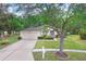 Charming one-story home featuring a well-manicured lawn and a two-car garage at 1934 Samantha Ln, Valrico, FL 33594