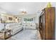 Inviting living room with comfortable seating, an entertainment center, and access to the outdoor patio at 1934 Samantha Ln, Valrico, FL 33594