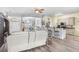 Open-concept living space featuring a modern interior design, wood floors, and bright light at 1934 Samantha Ln, Valrico, FL 33594