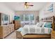 Calming main bedroom featuring a window view and neutral tones at 1934 Samantha Ln, Valrico, FL 33594