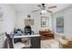Home office featuring modern desk, leather chair, vintage cabinet, and neutral paint at 1934 Samantha Ln, Valrico, FL 33594