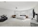 Spacious primary bedroom with natural light and ample room for a sitting area and personal touches at 20102 Oakflower Ave, Tampa, FL 33647
