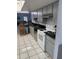 Features stainless steel appliances, tile floors, and a breakfast bar at 2026 Aaron Pl, Clearwater, FL 33760