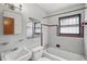 Classic bathroom with a tiled shower and framed mirror, creating a refreshing space at 2034 Upton S Ct, St Petersburg, FL 33712