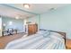 Spacious bedroom with a large dresser, desk, ceiling fan, and carpet flooring at 2035 29Th N Ave, St Petersburg, FL 33713