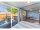 Bedroom including sliding glass doors to outdoor patio with a hot tub and exterior seating at 2035 29Th N Ave, St Petersburg, FL 33713