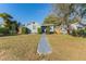 Charming single-story home featuring a well-maintained lawn, tidy landscaping, and a welcoming front entrance at 2035 29Th N Ave, St Petersburg, FL 33713