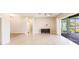 Bright open living room leads out to a screened in pool area at 2100 Aqui Esta Dr, Punta Gorda, FL 33950