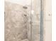 New bathroom shower featuring gray marble tiles and shower head at 2100 Aqui Esta Dr, Punta Gorda, FL 33950