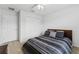 Cozy bedroom with carpet, closet, queen size bed and ceiling fan at 2129 Lennox Dale Ln, Brandon, FL 33510
