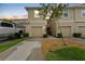 Inviting townhome featuring a one car garage, neutral paint and well maintained landscaping at 2129 Lennox Dale Ln, Brandon, FL 33510