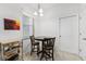 Cozy kitchen nook featuring a round table and decorative artwork at 2129 Lennox Dale Ln, Brandon, FL 33510