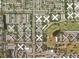 Aerial view of a community showcasing numerous residences and a golf course at 2360 Irish Ln # 16, Clearwater, FL 33763
