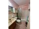 Bathroom with a tub and shower combination, as well as a single sink vanity at 2360 Irish Ln # 16, Clearwater, FL 33763