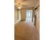 Bedroom area with a doorway and an in-unit washer and dryer at 2360 Irish Ln # 16, Clearwater, FL 33763