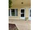 Unit entrance featuring a white door and window at 2360 Irish Ln # 16, Clearwater, FL 33763