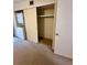Bedroom closet and a stackable washer and dryer unit at 2360 Irish Ln # 16, Clearwater, FL 33763