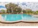 Large community swimming pool offers a refreshing escape with ample seating and a relaxing atmosphere for residents at 2360 Irish Ln # 16, Clearwater, FL 33763
