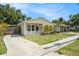 Charming single-story home with well-maintained lawn and landscaping at 2604 E Chelsea St, Tampa, FL 33610