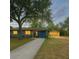 Charming single story home with mature trees, long driveway, and detached garage at 306 Oak Ave, Brandon, FL 33510