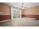 Bright living room featuring neutral walls and a large bay window at 3413 W Kirby St, Tampa, FL 33614