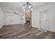 Open living room with a stone fireplace and access to the outdoors at 3413 W Kirby St, Tampa, FL 33614