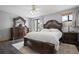 Traditional bedroom with a spacious layout, decorative furniture set and a plush bed with matching linens at 3413 W Kirby St, Tampa, FL 33614