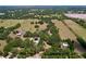 High angle shot of a spacious property featuring a well-maintained land area dotted with scattered trees at 3544 Porter Rd, Lithia, FL 33547