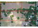 Large parcel of land with distinct sections of cleared space and natural wooded areas, surrounded by an orange boundary at 3544 Porter Rd, Lithia, FL 33547