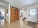 Bright foyer features tile flooring, closet storage, and a doorway, creating a welcoming and organized entrance at 3544 Porter Rd, Lithia, FL 33547
