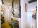 Hallway with an HVAC system and full size refrigerator with a glimpse into the dining room at 3544 Porter Rd, Lithia, FL 33547