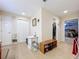 Hallway with a closet and entrance to a bedroom with tiled flooring at 3544 Porter Rd, Lithia, FL 33547