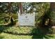 Entrance to Scottsdale Villas III, a community featuring beautiful landscaping and peaceful surroundings at 368 Perth Ct # 368, Dunedin, FL 34698