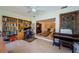 Functional home office space with ample bookshelves, a computer desk, and natural light at 368 Perth Ct # 368, Dunedin, FL 34698