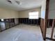 A bedroom with partial framing and a window at 378 79Th Ne Ave, St Petersburg, FL 33702